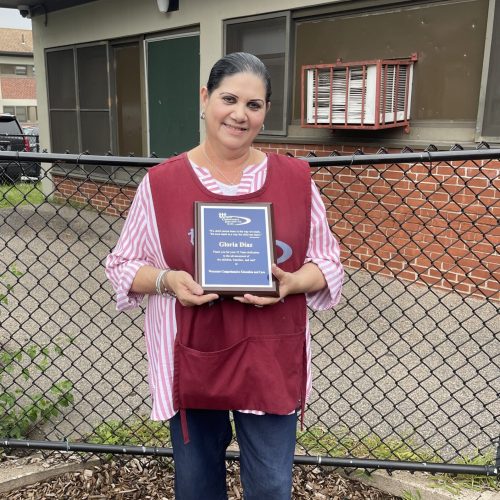 Gloria Daz with plaque